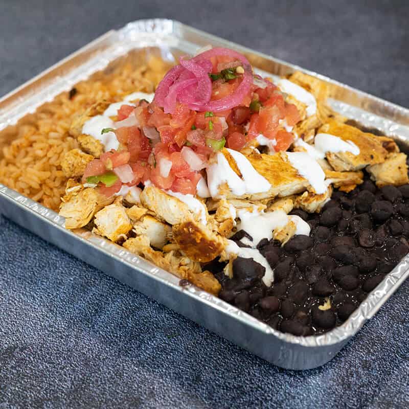 A City Tamale lunch platter with rice and beans