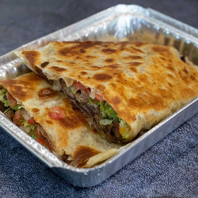 A grilled quesadilla from the City Tamale menu